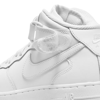 White youth mid-top sneakers, close-up of collar and swoosh with Air branding
