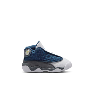 Toddler sneaker in navy knit upper with white trim and gray outsole
