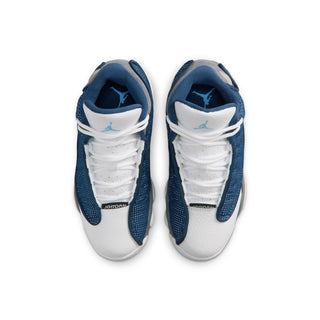 Kids sneakers top view with white laces, blue accents, and Jumpman logo on tongue