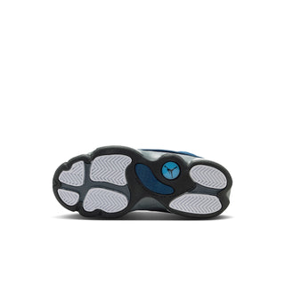 Kids sneaker outsole in dark gray with blue and white tread pattern