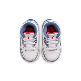 Toddler retro sneakers with white laces, blue collar, and red-lined tongue