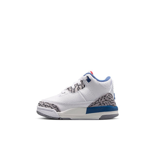 Toddler retro sneakers side view in white with blue trim and gray speckled side panel