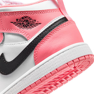 Kids sneaker close-up: black swoosh, Air Jordan Wings logo, and pink rubber sole