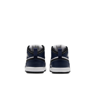 Toddler mid-top sneakers in white and navy with heel panel and dark sole