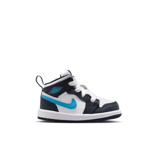 Toddler mid-top sneakers, white with dark navy and light blue Nike swoosh, lace-up