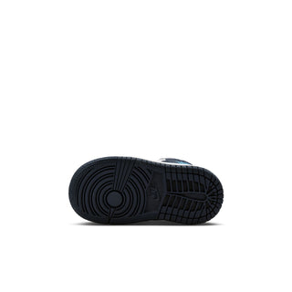 Toddler mid-top sneaker outsole, dark rubber tread with textured circular pattern