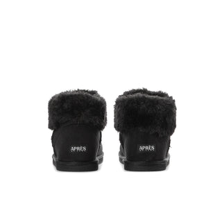 Youth black low boots with 'APRES' heel patch and faux-fur lining
