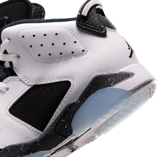 Kids Retro 6 toe and side panel close-up in white with black accent sole