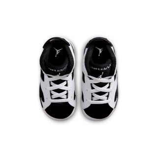 Toddler high-top sneakers, white leather uppers with black lining and lace-up.