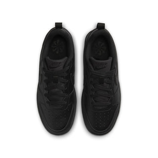 Pair of youth black sneakers from above, showing tongues and lace eyelets