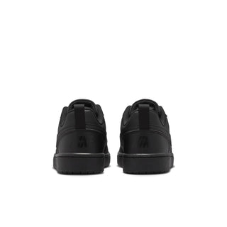 Youth black low-top sneakers from the back with cushioned heel and tabs