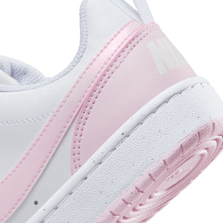 Youth sneaker side close-up, white collar with pink panel and embossed Nike detail