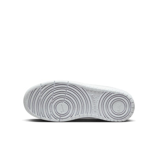 Youth white low-top sneaker outsole with circular traction pattern