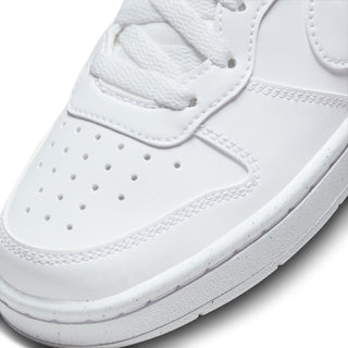 White leather-look sneaker upper close-up with perforated toe and stitched overlays