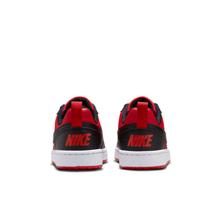 Youth low-top sneakers, back view with red heel tab and black upper over white midsole.