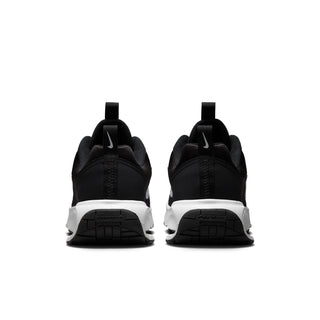 Rear view of black Nike Air Max INTRLK Lite sneakers with white midsoles and heel pull tabs