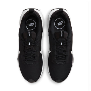 Top view of black Nike Air Max INTRLK Lite sneakers showing laces, insoles, and white midsoles