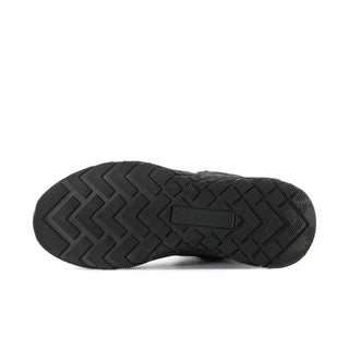 Black boot outsole with zigzag tread pattern and textured rubber grip