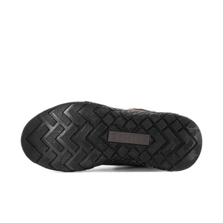 Dark brown boot outsole with textured tread and brand logo strip