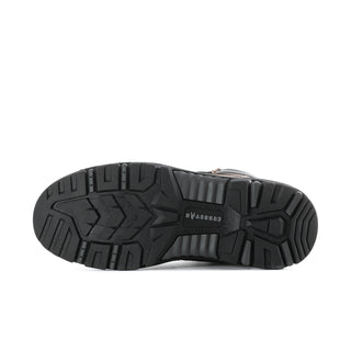 Outsole tread of brown steel-toe work boots in black rugged rubber pattern