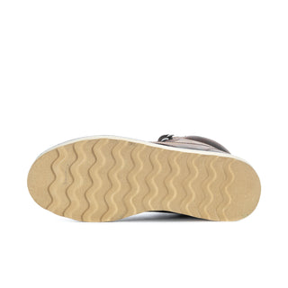 Men's steel-toe boot outsole with light beige tread and dark heel edge