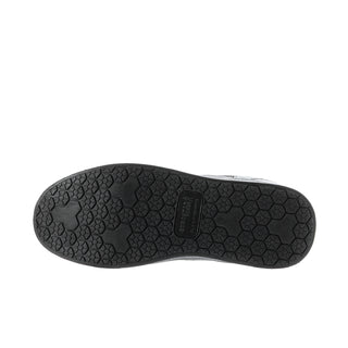 Women's black low-top sneaker outsole with textured tread pattern