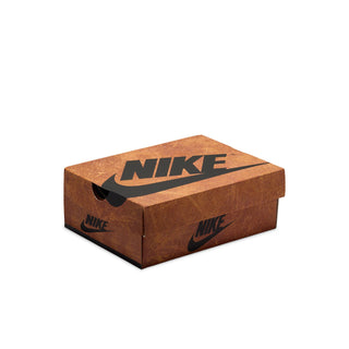 Nike-branded shoe box with brown textured finish and black swoosh logos