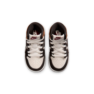 Toddler high-top sneaker tongues with Nike logo and white laces