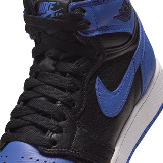 Close-up of youth high-top sneaker laces, black leather with blue Nike swoosh