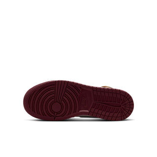 Youth high-top sneaker outsole with textured tread and burgundy-red rubber