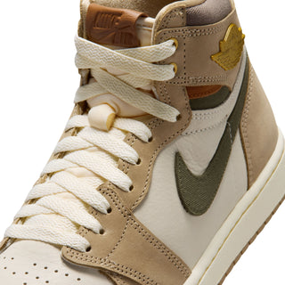 Close-up of high-top sneakers with sail laces, tan suede, and olive swoosh
