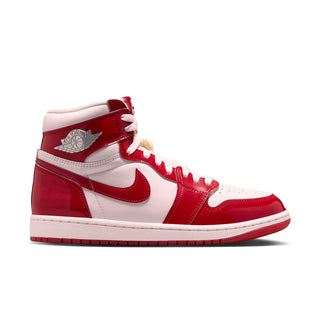 High-top sneakers in white, red, and light pink with red Nike swoosh