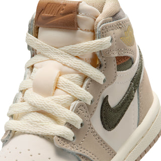 Close-up of toddler high-top sneaker with woven laces, khaki leather, olive swoosh