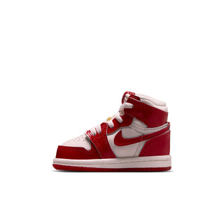 Toddler high-top sneaker in red and white with side Nike swoosh and lace-up front
