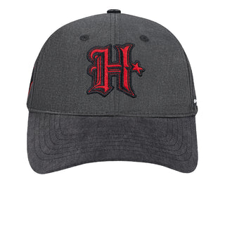 Washed black Texans strapback cap with red “H” logo and side stars
