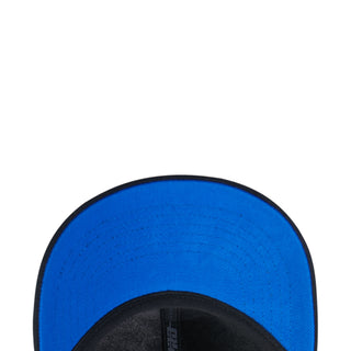 Blue interior panel of a strapback cap