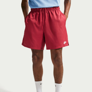 Men's crimson athletic shorts with drawstring waist and small Nike side logo