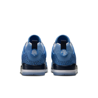 Rear view of blue Jordan Spizike Low sneakers with patterned heels and navy midsoles.