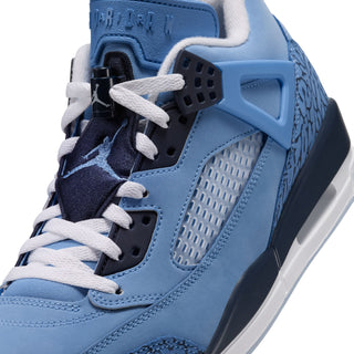 Jordan Spizike Low men's sneaker close-up, blue leather, white laces, navy accents and mesh panels.