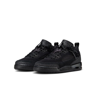 Youth black low-top sneakers shown from side, with lace-up front and padded collar