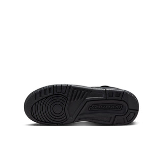 Youth sneaker outsole in dark rubber with traction pattern and Jordan logo