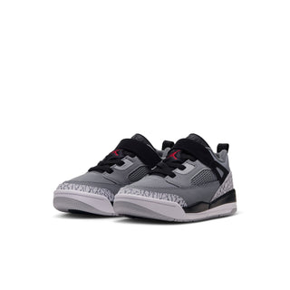 Kids' pair of low-top sneakers, cool grey upper with black heel cup and red highlights.