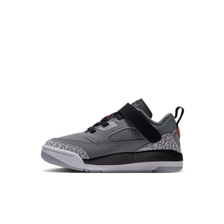 Kids' low-top sneakers in cool grey with black overlays and red accents, lace-up.