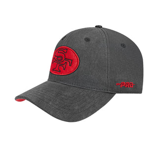 Washed black strapback cap with red embroidered logo on front and side tag