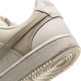Cream sneaker midsole with textured rubber edge and outsole detail