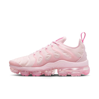 Women's pink lace-up sneakers in side view, featuring sculpted upper and air sole