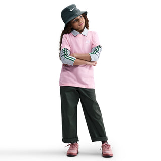 Youth pink short-sleeve tee with Nike logo on chest, side pose