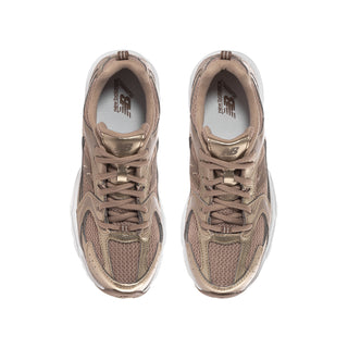 Youth lace-up sneaker upper in taupe with padded collar and visible interior lining.