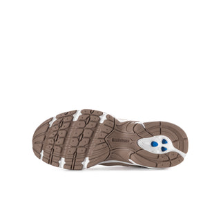 Youth running shoe outsole view: brown tread with white midsole and blue accent.