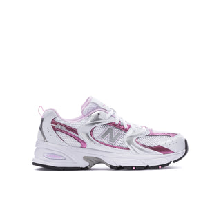 Youth sneakers side view in white with pink and lavender overlays, lace-up design